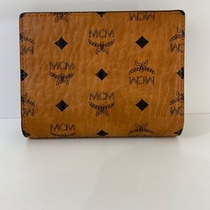 Pre Owned MCM Cognac Monogram Bifold Wallet with Chain & Box.
